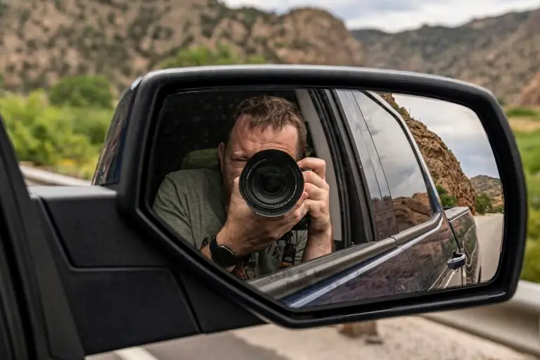 Rick capturing a photo in the sideview mirror.